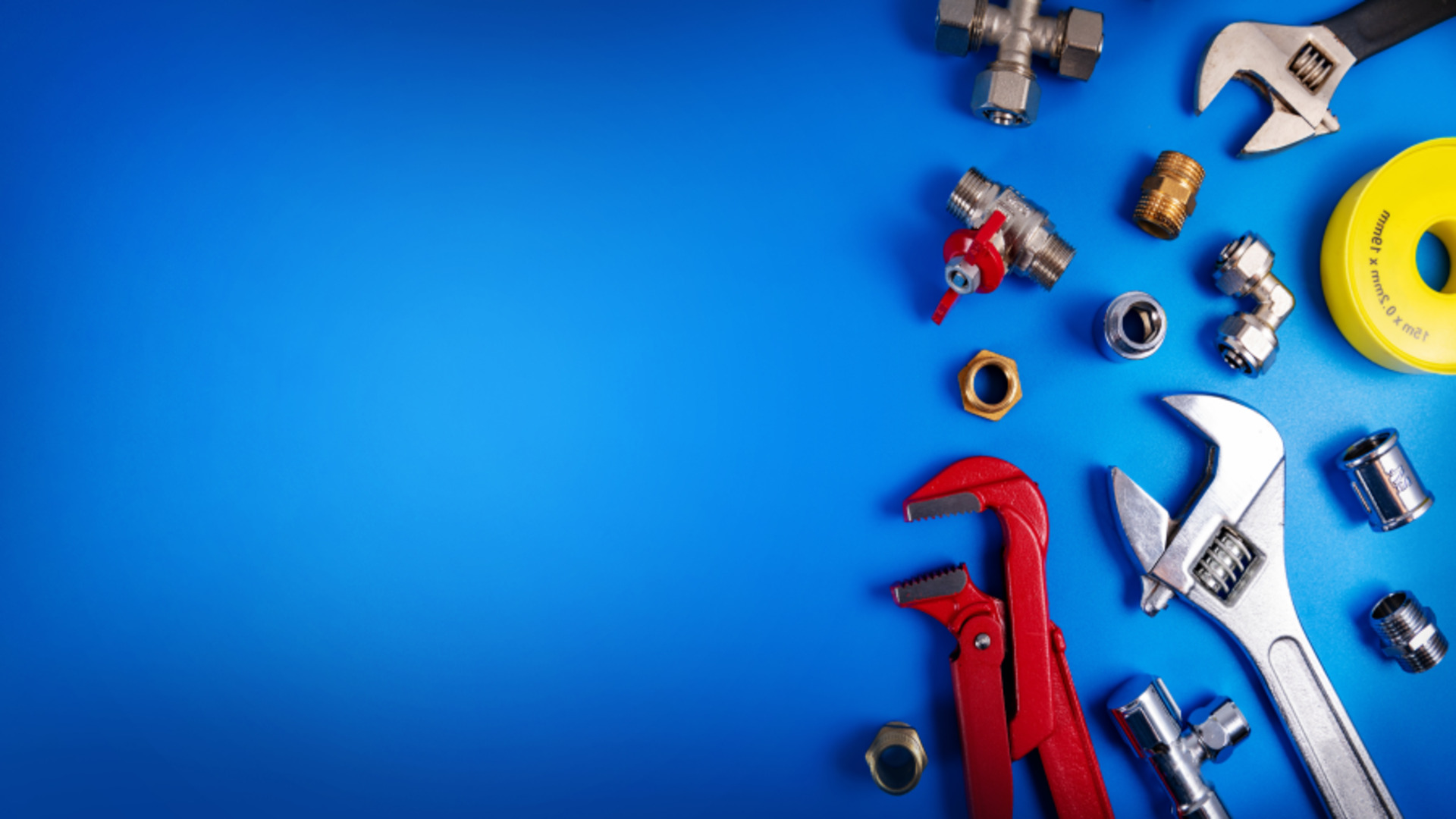 Professional plumber working on heating system installation